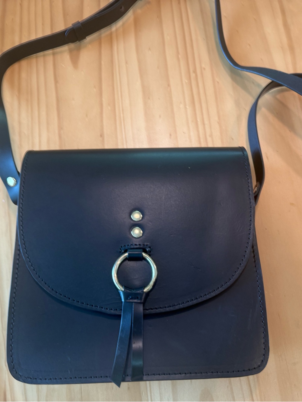 Mahetri designer Black Leather Crossbody Bag with Gold Ring Accent